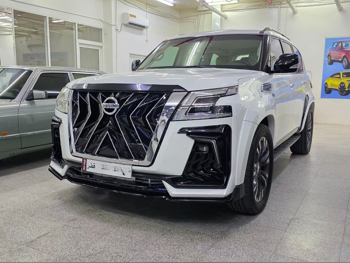 نيسان  باترول  اس اي  2013  اوتوماتيك  226,000 كم  8 سلندر  دفع رباعي  اس يو في  أبيض