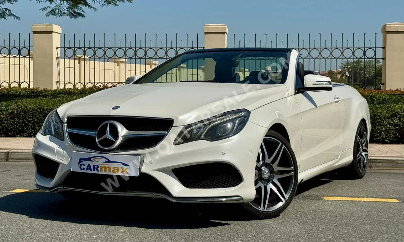 Mercedes-Benz  E-Class  400  2014  Automatic  140,000 Km  6 Cylinder  Rear Wheel Drive (RWD)  Convertible  White