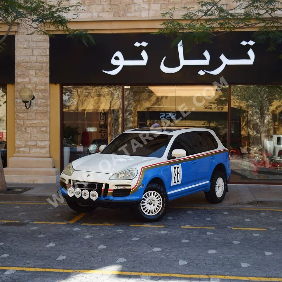 بورش كيان 2008 اوتوماتيك 135,350 كم 6 سلندر دفع رباعي اس يو في أزرق و أبيض