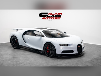 بوغـاتي  شيرون  2021  اوتوماتيك  8,772 كم  16 سلندر  دفع كلي مستمر  كوبيه \ سبورت  أبيض