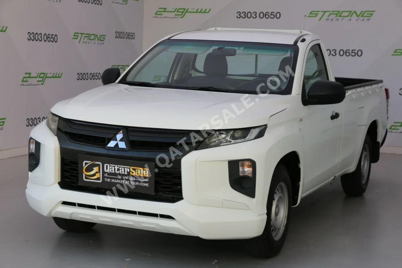 ميتسوبيشي ال 200 2022 عادي 12,000 كم 4 سلندر دفع خلفي بيكب أبيض
