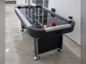 أسود طاولة الهوكي