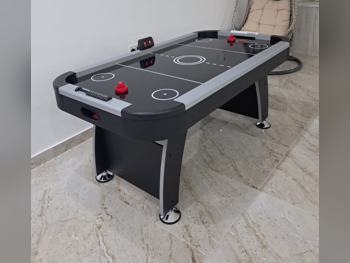 أسود طاولة الهوكي