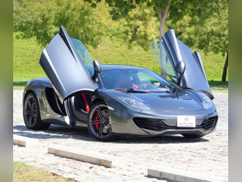 Mclaren  MP4- 12C  2013  Automatic  50,000 Km  8 Cylinder  Rear Wheel Drive (RWD)  Coupe / Sport  Gray