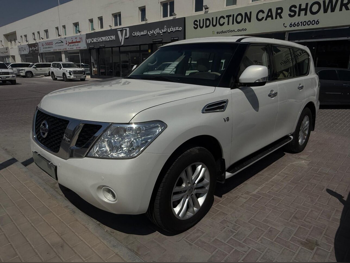 نيسان  باترول  ال اي  2013  اوتوماتيك  299,000 كم  8 سلندر  دفع رباعي  اس يو في  أبيض