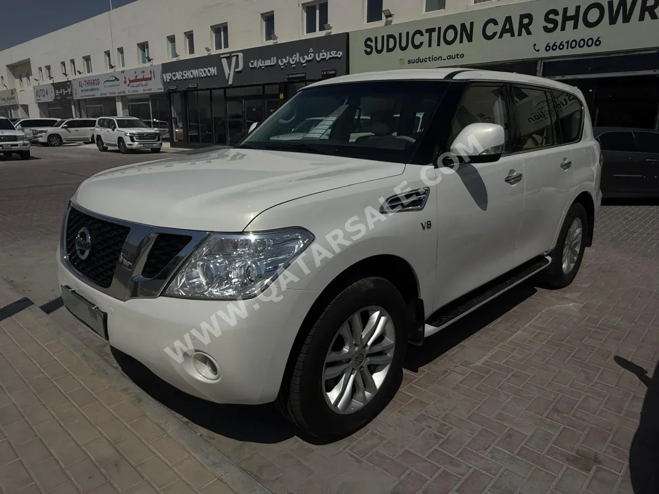 Nissan  Patrol  LE  2013  Automatic  299,000 Km  8 Cylinder  Four Wheel Drive (4WD)  SUV  White