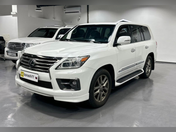 Lexus  LX  570 S  2014  Automatic  292,000 Km  8 Cylinder  Four Wheel Drive (4WD)  SUV  White