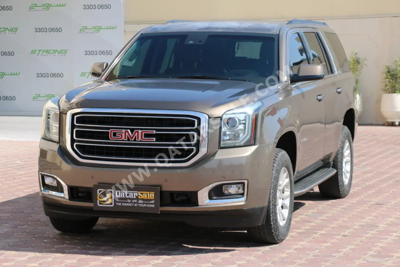 GMC  Yukon  2016  Automatic  167,000 Km  8 Cylinder  Four Wheel Drive (4WD)  SUV  Bronze