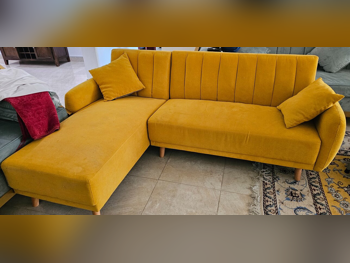 الأرائك والكنب والكراسي هوم سينتر  شكل L  - قماش  - أصفر