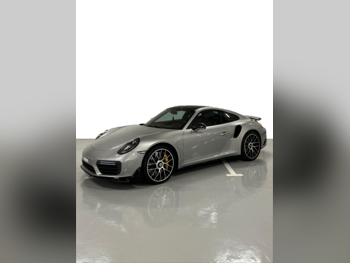 بورش  911  توربو اس  2017  اوتوماتيك  58,000 كم  6 سلندر  دفع خلفي  كوبيه \ سبورت  رمادي فاتح  تحت الضمان