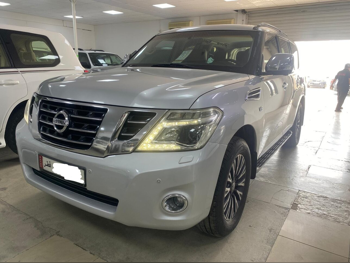 نيسان  باترول  بلاتنيوم  2015  اوتوماتيك  320,000 كم  8 سلندر  دفع رباعي  اس يو في  فضي