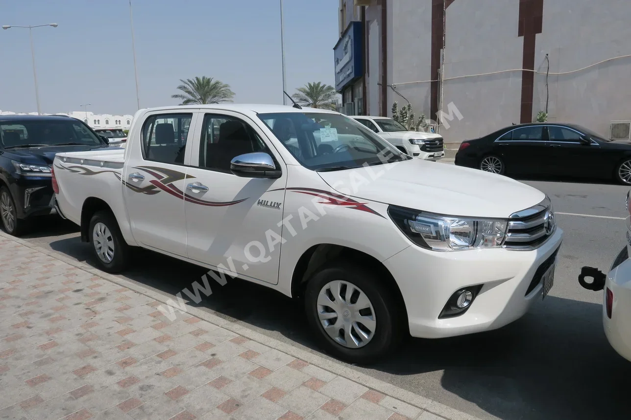 تويوتا هاي لوكس 2026 اوتوماتيك 0 كم 4 سلندر دفع خلفي بيكب أبيض تحت الضمان