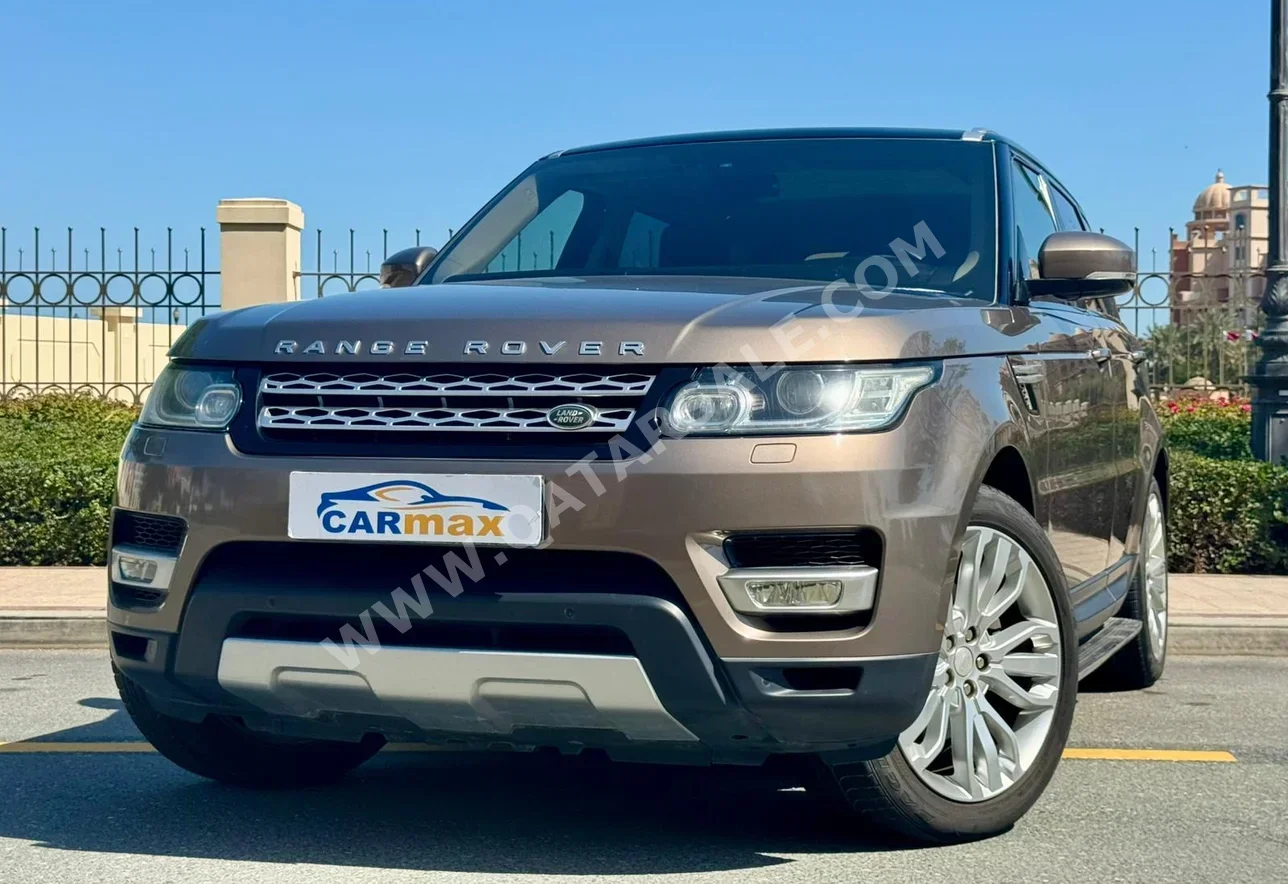 لاند روفر رنج روفر سبورت 2015 اوتوماتيك 79,000 كم 6 سلندر دفع رباعي اس يو في برونزي