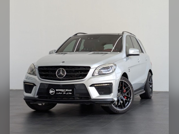 مرسيدس - بنز  ام ال  63 AMG  2014  اوتوماتيك  116,214 كم  8 سلندر  دفع كلي مستمر  اس يو في  فضي