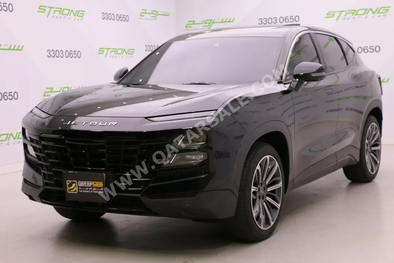 Jetour  Dashing  Flag Ship  2024  Automatic  33,000 Km  4 Cylinder  Four Wheel Drive (4WD)  SUV  Black  With Warranty