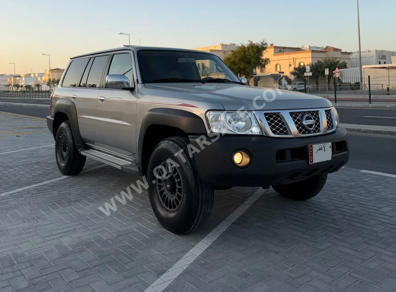 نيسان باترول جي ال 2021 عادي 100,000 كم 6 سلندر دفع رباعي اس يو في فضي