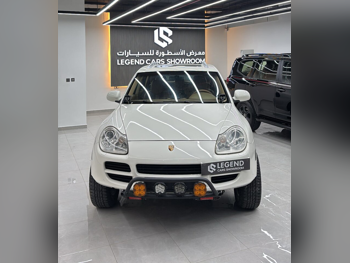 بورش  كيان  اس  2004  اوتوماتيك  236,000 كم  8 سلندر  دفع رباعي  اس يو في  أبيض لؤلؤي