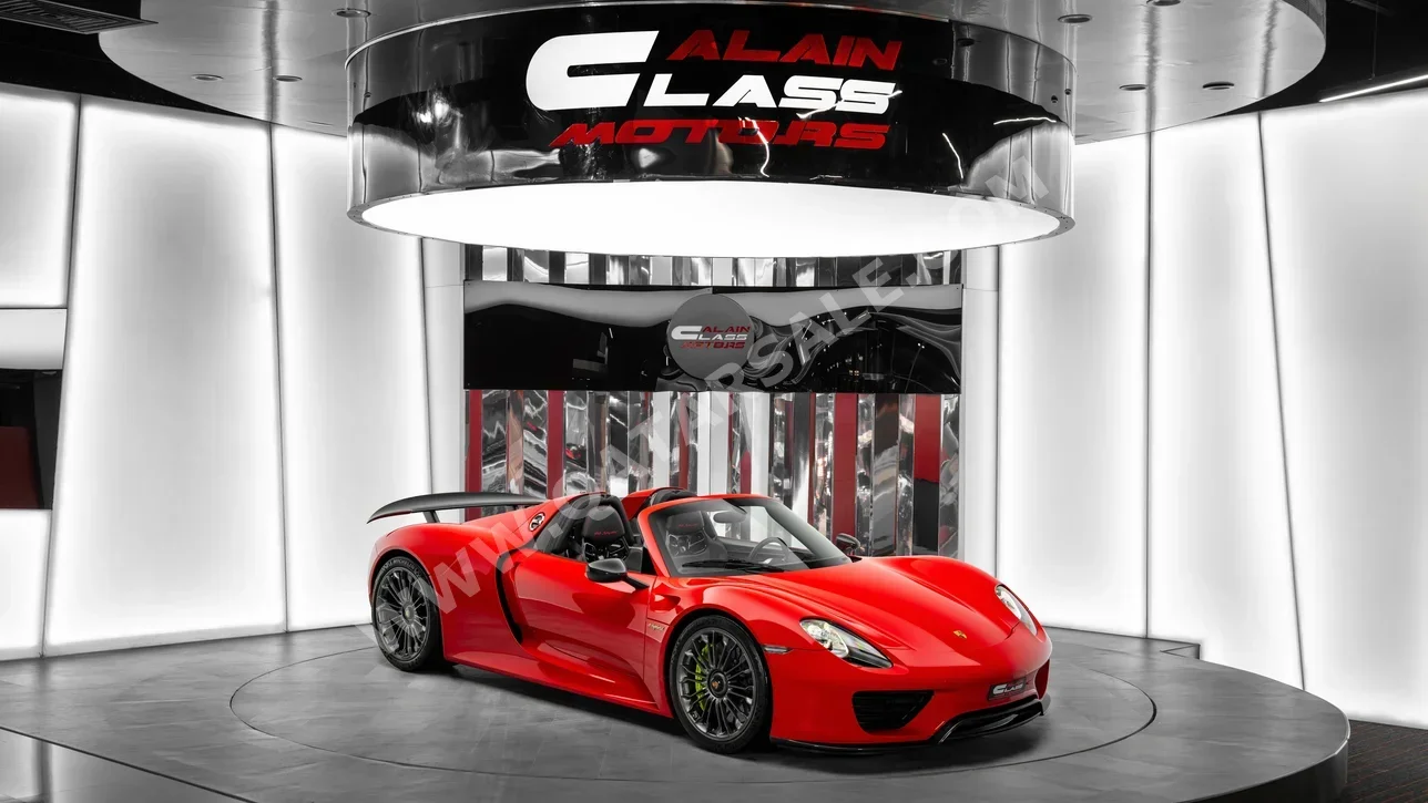 Porsche  918  Spyder  2015  Automatic  195 Km  8 Cylinder  All Wheel Drive (AWD)  Convertible  Red