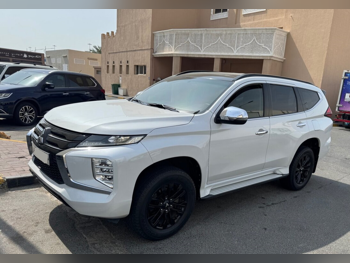 Mitsubishi  Pajero  Montero Sport  2022  Automatic  57,000 Km  6 Cylinder  Four Wheel Drive (4WD)  SUV  White  With Warranty