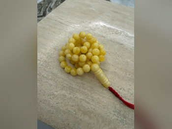 مسبحة كهرمان  أبيض لؤلؤي  قطر  البيضاوي / الدائرة  13 ملي  83 غرام