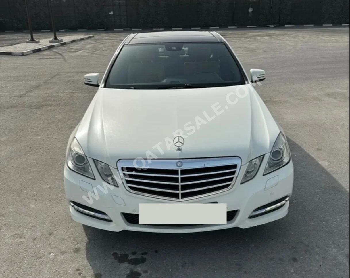 مرسيدس - بنز  اي - كلاس  300  2012  اوتوماتيك  63,000 كم  6 سلندر  دفع خلفي  سيدان  أبيض