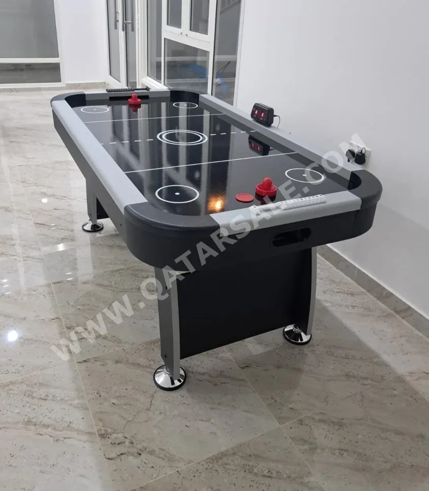 أسود طاولة الهوكي