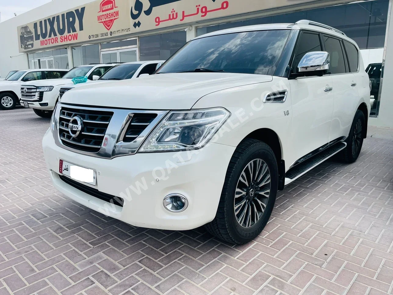 Nissan  Patrol  Platinum  2015  Automatic  358,000 Km  8 Cylinder  Four Wheel Drive (4WD)  SUV  White