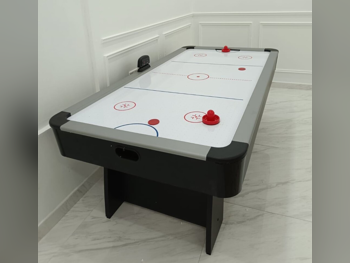 أبيض و أسود  طاولة الهوكي