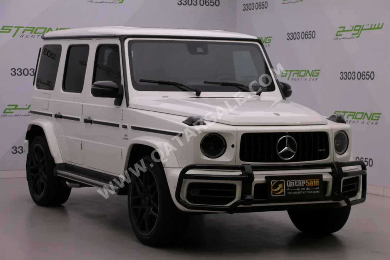 مرسيدس - بنز  جي - كلاس  63 اي ام جي  2022  اوتوماتيك  90,000 كم  8 سلندر  دفع رباعي  اس يو في  أبيض  تحت الضمان