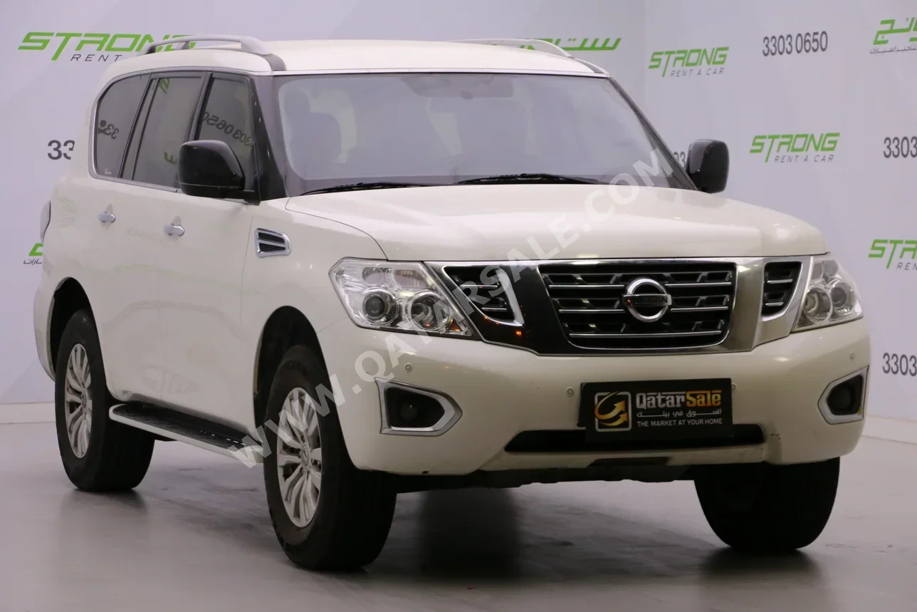 Nissan  Patrol  XE  2019  Automatic  235,000 Km  6 Cylinder  Four Wheel Drive (4WD)  SUV  White