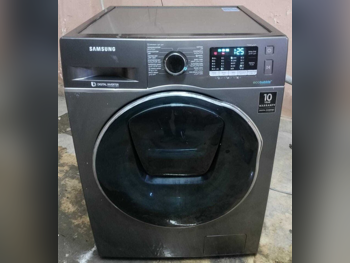 غسالة ملابس & الكل في واحد سامسونج \ غسالة تحميل أمامي اللون الرمادي