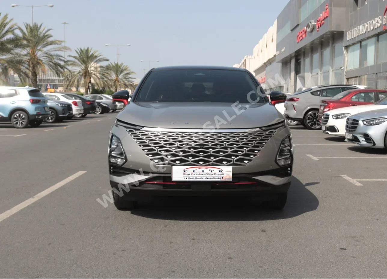 Omoda  C5  2024  Automatic  0 Km  4 Cylinder  Front Wheel Drive (FWD)  SUV  Red and Gray  With Warranty