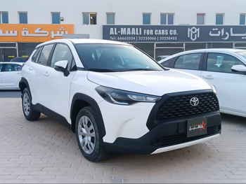 Toyota  Corolla  Cross Hybrid  2024  Automatic  61,000 Km  4 Cylinder  Four Wheel Drive (4WD)  SUV  White