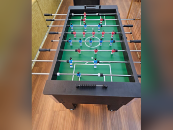 Green and Black Foosball Table