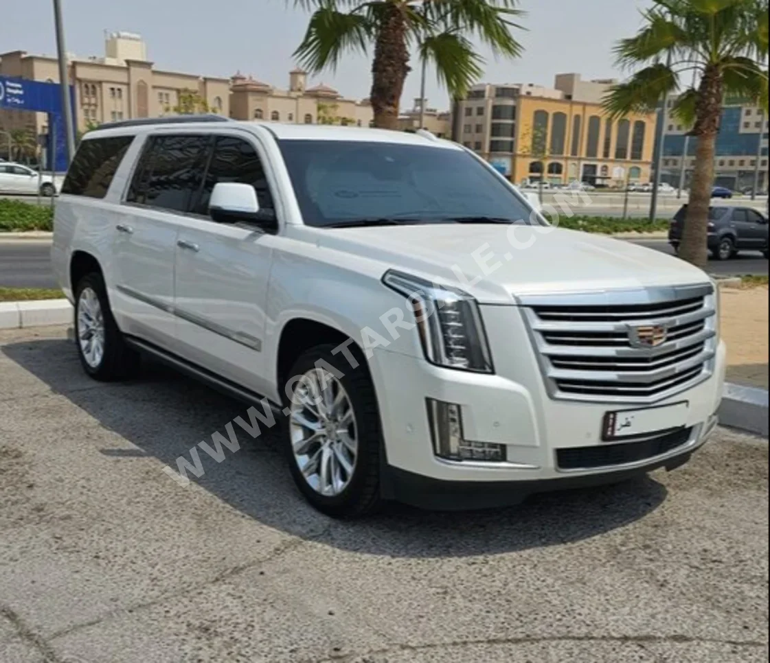 Cadillac  Escalade  Platinum  2019  Automatic  40,000 Km  8 Cylinder  Four Wheel Drive (4WD)  SUV  White  With Warranty
