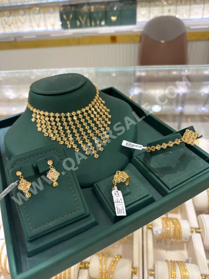 الذهب طقم البحرين نسائي حسب القطعة ( ديزاينرز) بدون حجر ضمان الصيانة توصيل مجاني ذهب أصفر عيار 21