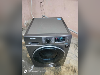 غسالة ملابس & الكل في واحد سامسونج \ غسالة تحميل أمامي فضة