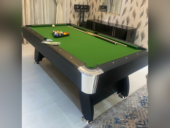 Green and Black Billiard Table