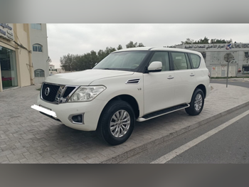 Nissan  Patrol  SE  2016  Automatic  143,000 Km  8 Cylinder  Four Wheel Drive (4WD)  SUV  White
