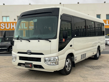 تويوتا  كوستر  2022  عادي  165,000 كم  4 سلندر  دفع خلفي  فان \ باص  أبيض