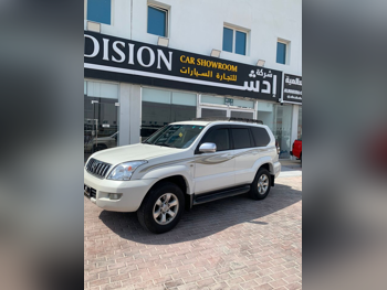 تويوتا  برادو  في اكس  2009  اوتوماتيك  230,000 كم  6 سلندر  دفع رباعي  اس يو في  أبيض