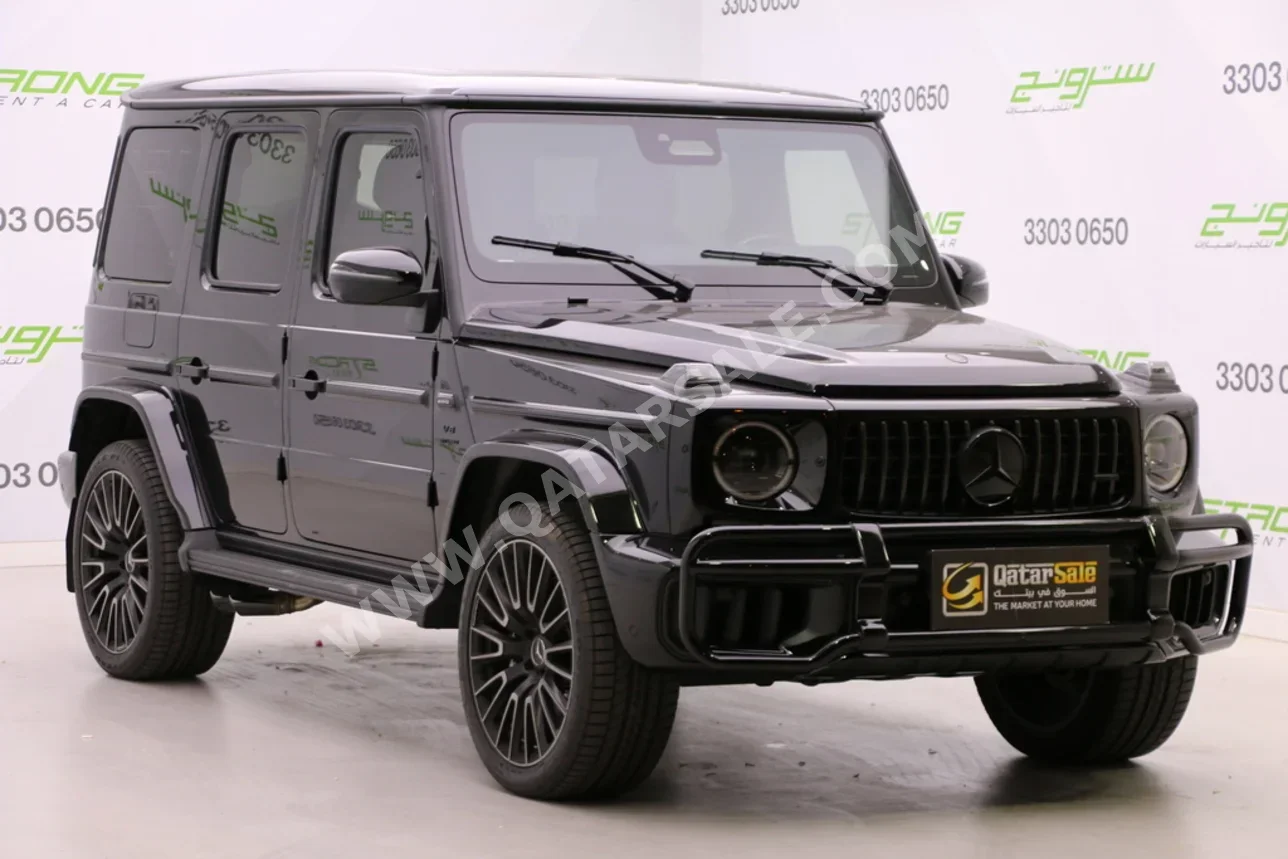مرسيدس - بنز جي - كلاس 63 اي ام جي 2026 اوتوماتيك 330 كم 8 سلندر دفع رباعي اس يو في أسود تحت الضمان