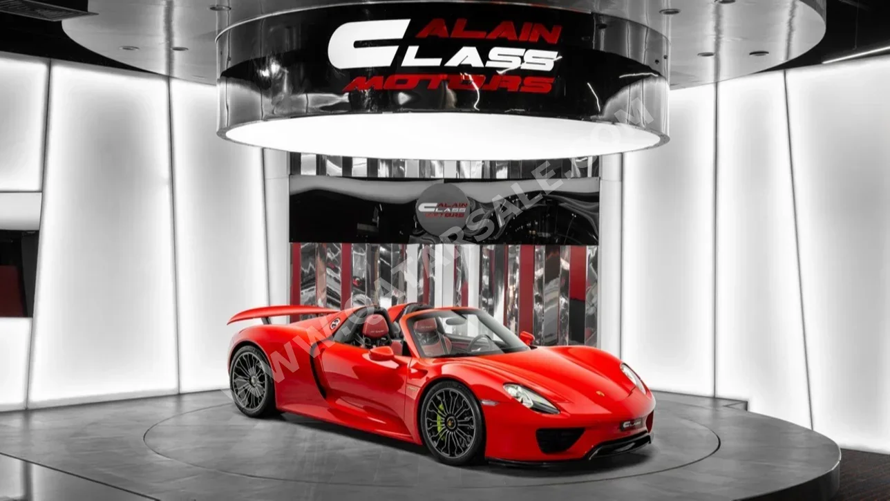Porsche  918  Spyder  2015  Automatic  413 Km  8 Cylinder  All Wheel Drive (AWD)  Convertible  Red