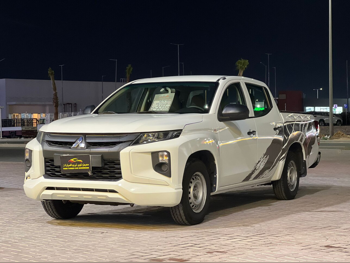 Mitsubishi  L 200  2020  Manual  133,000 Km  4 Cylinder  Rear Wheel Drive (RWD)  Pick Up  White