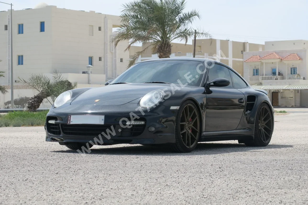 بورش  911  توربو  2007  اوتوماتيك  74,000 كم  6 سلندر  دفع خلفي  كوبيه \ سبورت  أسود