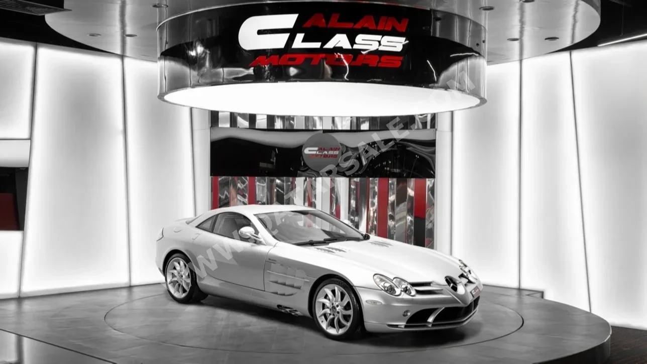 مرسيدس - بنز  اس ال ار  مكلارين  2005  اوتوماتيك  17,436 كم  8 سلندر  دفع خلفي  كوبيه \ سبورت  فضي