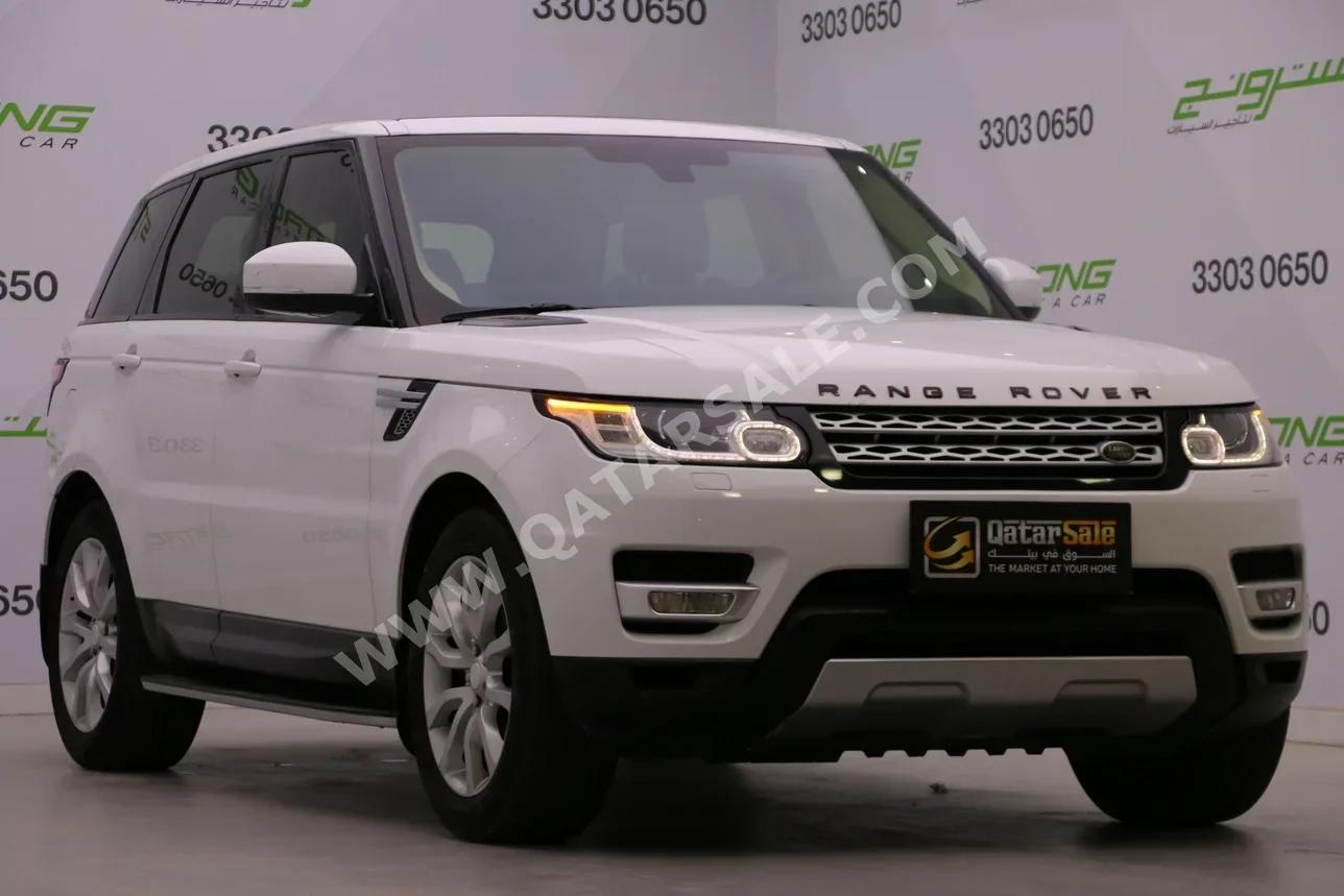 Land Rover  Range Rover  Sport  2014  Automatic  206,000 Km  6 Cylinder  Four Wheel Drive (4WD)  SUV  White