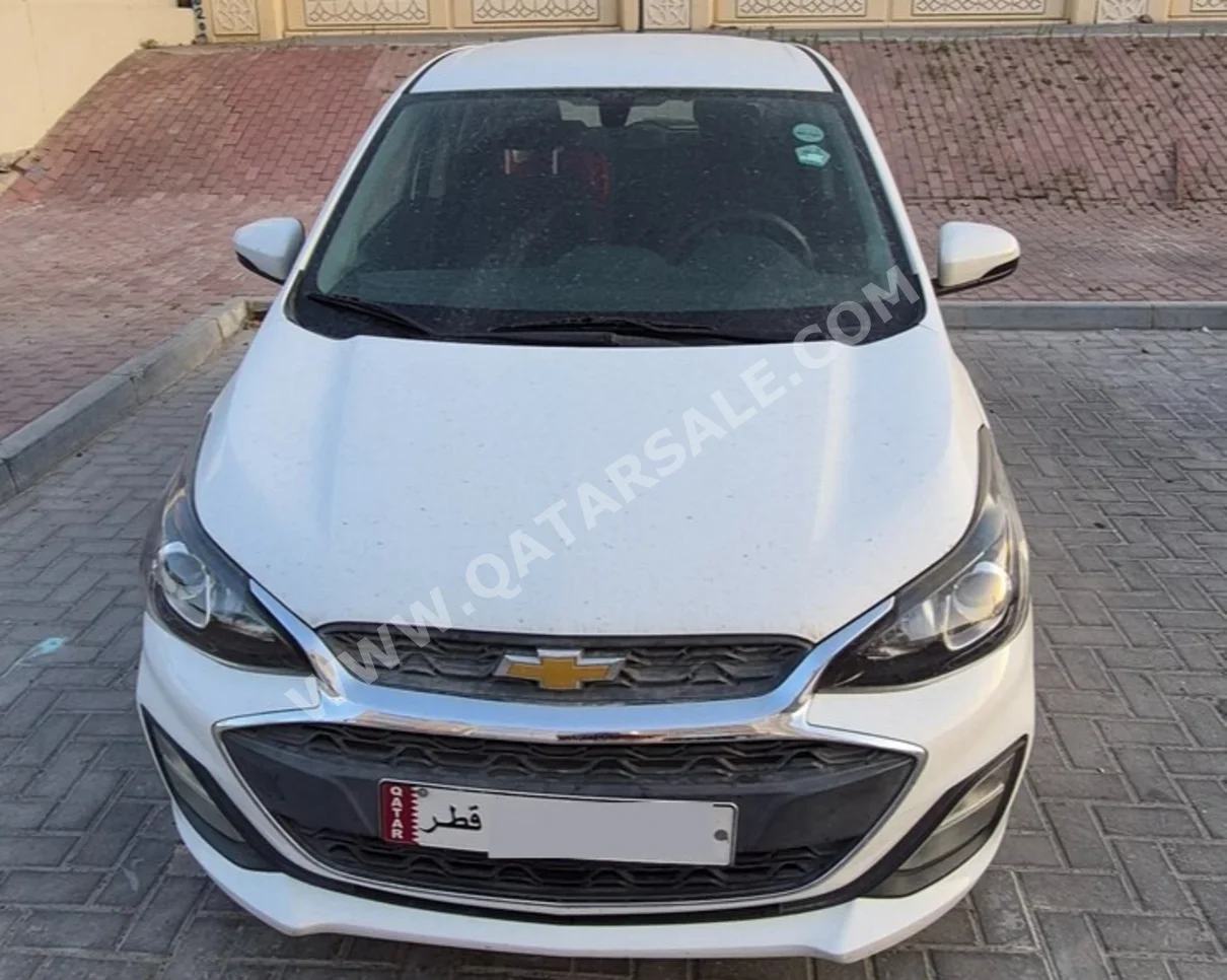 Chevrolet  Spark  2019  Automatic  73,000 Km  4 Cylinder  Front Wheel Drive (FWD)  Hatchback  White