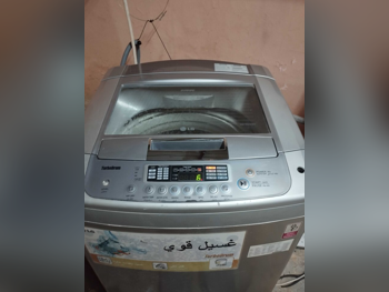 مجموعات الغسالات والمجففات ال جي \  13 كغ  ستانلس ستيل  غسالة بالبخار  قابل للتخزين  مع التسليم  مع التركيب  غسالة تحميل علوي  كهرباء