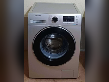 مجموعات الغسالات والمجففات سامسونج \  8 كغ  ستانلس ستيل  غسالة بالبخار  قابل للتخزين  مع التركيب  غسالة تحميل أمامي  كهرباء